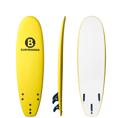 Three views of a yellow b surfboard on a plain white background: the top deck is bright yellow with a black circular B logo and the word SURFBOARDS, the side view shows a yellow edge with blue fin hardware, and the bottom deck is white with a yellow edge and three black high performance fins.
